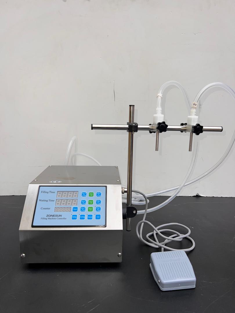 Double Nozzle Liquid Filling Machine